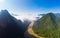 Aerial panoramic Nam Ou River Nong Khiaw Muang Ngoi Laos, dramatic landscape scenic pinnacle cliff river valley with morning fog