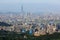 Aerial panoramic scene of overpopulated Taipei City in a hazy morning with a view of Taipei 101 tower in XinYi District