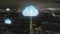 Aerial panoramic shot of large city at night. Weather forecast visual effect. Rotating icon of cloud. Los Angeles, USA