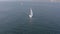 Aerial panoramic shot of yachts sailing along the coast of California