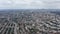 Aerial panoramic sliding view of cityscape. Transport infrastructure going through residential district. London, UK