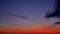 Aerial panoramic time lapse of epic twilight sky with cirrus clouds in pink, red and blue colors. Sunset horizon from the top of