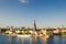 Aerial panoramic top view of Riddarholmen district, Riddarholm Church and typical sweden gothic buildings, boat ship sailing on