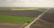 Aerial panoramic video in 4K from the drone, a bird`s eye view of expressway with cars and trucks, abstract geometric