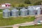 aerial panoramic view on agro-industrial complex with silos and grain drying line