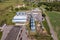 aerial panoramic view on agro-industrial complex with silos and grain drying line