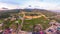 Aerial panoramic view of the ancient citadel of Naryn-Kala, fortress wall. Photography from above early in the morning