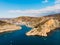 Aerial panoramic view of Balaklava bay in Crimea, mountain cliffs and sea with ships. Beautiful nature panorama landscape