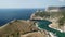 Aerial panoramic view of Balaklava landscape with boats and sea in marina bay. Crimea Sevastopol tourist attraction