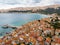 Aerial panoramic view of Baska town, popular touristic destination on island Krk, Croatia, Europe