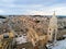 Aerial Panoramic View of the Belltower of the Cathedral of St. Maria La Bruna on Cloudy Sky at Sunset