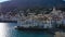 Aerial panoramic view of Cadaques Spain. Curious birds seagulls fly close to the camera. Video footage 4K.