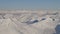 Aerial Panoramic View of Canadian Mountain covered in snow