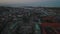 Aerial panoramic view of Christiansborg palace with tall tower. Evening shot of city at twilight. Copenhagen, Denmark