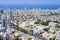 Aerial panoramic view of the city buildings and private houses.