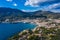 Aerial panoramic view of city Cadaques, sea and mountains, Beautiful Spanish small city by the sea. Drone photo of