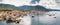 Aerial panoramic view of city Komiza - the one of numerous port towns in Croatia, is a lot of moored sailboats of a