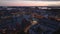 Aerial panoramic view of city at sunset. Waterfront and buildings in bay. Modern town development. Helsinki, Finland