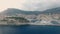 Aerial panoramic view of cityscape of Monte Carlo, yachts in harbour, landscape panorama of Monaco from above.