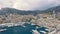 Aerial panoramic view of cityscape of Monte Carlo, yachts in harbour, landscape panorama of Monaco from above, Europe.