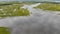 Aerial panoramic view on the coastal wetland with rain cloudedsky on the
