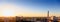 Aerial panoramic view of evening sunset cityscape, industrial area