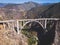 Aerial panoramic view of historic Bixby Creek Bridge along world famous Pacific Coast Highway 1 in summer sunny day , Monterey