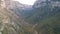 Aerial panoramic view of the impressive Vikos gorge in the Zagoria region at Pindus Mountains of northern Greece. It lies on the