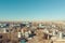 Aerial panoramic view of industrial factory or plant buildings with steel storage construction tanks and pipes