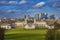Aerial panoramic view of London`s National Maritime Museum, the Royal Naval College Chapel and skyscrapers of Canary Wharf from