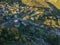 Aerial panoramic view over the picturesque village Papigo in Epirus, Greece at sunset. Scenic aerial view of traditional Greek