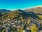 Aerial panoramic view over the picturesque village Papigo in Epirus, Greece at sunset. Scenic aerial view of traditional Greek