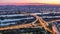 Aerial panoramic view over Vienna city with skyscrapers, historic buildings and a riverside promenade day to night