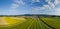 Aerial panoramic view of small town in rural Europen landscape and mountains in background, Slovenska Bistrica, Slovenia