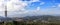 Aerial panoramic view on Telecommunication tower and Barcelona town from Tibidabo mount, Spain