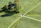 Aerial panoramic view from the top of Hohensalzburg fortress Castle on cultivated land divided by the crossing ways roads. Sal