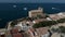 Aerial panoramic view townscape and old church of St Peter and St Paul at summer. Touristic ferries in the smooth tranquil Mediter