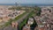 Aerial panoramic view of urban borough at seaside with parks and historic landmarks. Barcelona, Spain