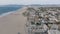 Aerial panoramic view of Venice beach. Wide sand covered ocean coast and buildings in urban borough. Los Angeles