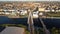 Aerial partial orbital clip of the Millennium Bridge over Southport Marine Lake