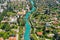 Aerial pass over Kibbutz Nir David with Amal river, Israel.