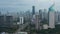 Aerial pedestal shot of busy city traffic driving in the modern city center with tall skyscrapers in Jakarta, Indonesia