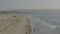 AERIAL: People at the Beach Waves,Water in Los Angeles, California, Sunny, Blue Sky