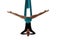 Aerial performer hanging on silk in symmetric pose