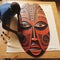 Aerial Perspective Artwork Inspired By Ugandan Wooden Mask On Linen