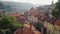 Aerial perspective of historic urban area with vintage buildings and red rooftops