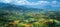 Aerial perspective of rural landscape with lush fields and agricultural land in natural setting