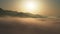 Aerial perspective view of flying over clouds, Sky with clouds and sun 4K aerial
