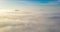 Aerial photo above the fog or white clouds with shining sun. Beautiful sunrise cloudy sky from aerial view. Above clouds from airp
