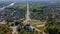 Aerial photo of ancient european Chernihiv town with church, trees and buildings near highway